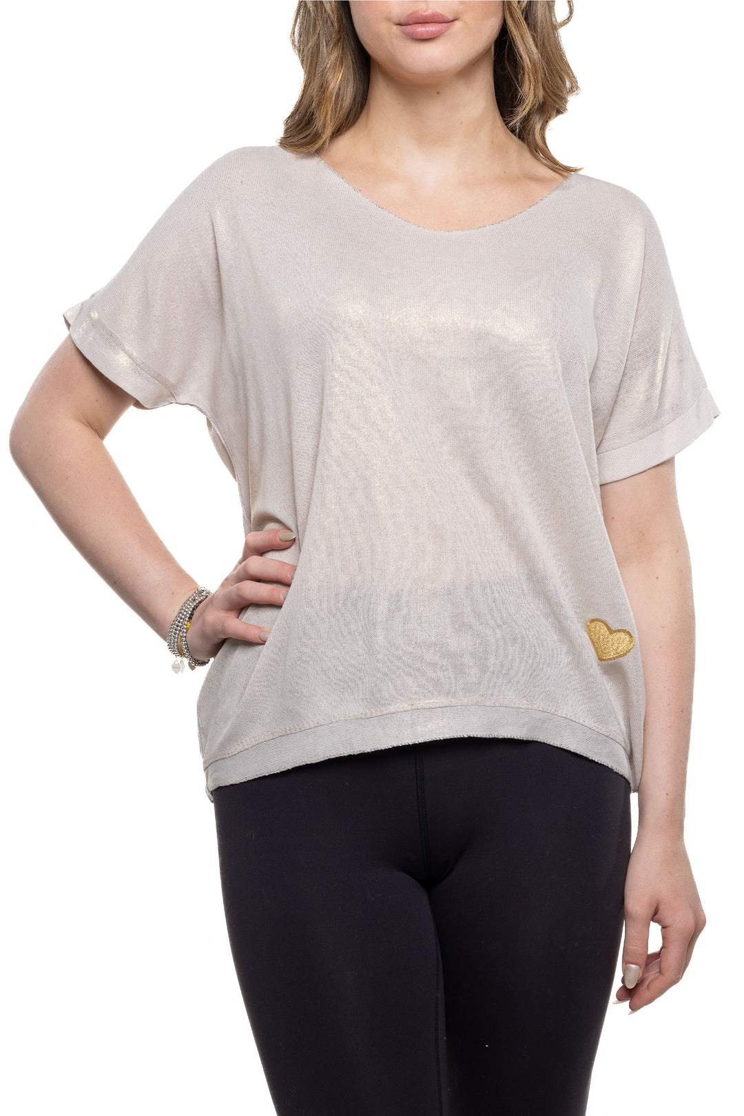 Etern Elle Summer 2024  The dolman cap sleeves and soft cut v-neck provide a flattering, loose fit. The finishing touch is a subtle silver sparkle shine and a little cute gold heart stitched in the corner. 