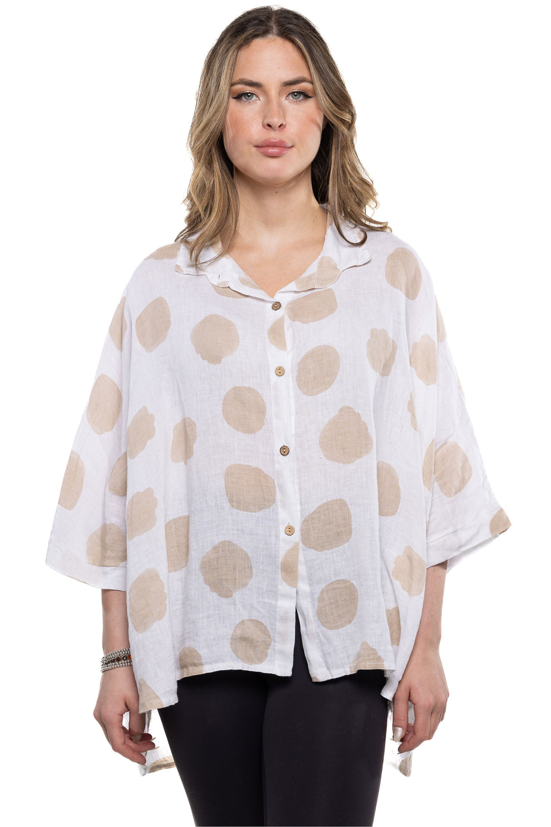 Etern Elle Summer 2024 The classic collar and full front buttons add a touch of sophistication, while the dolman sleeves and playful polka dot print make it a versatile piece for any occasion.