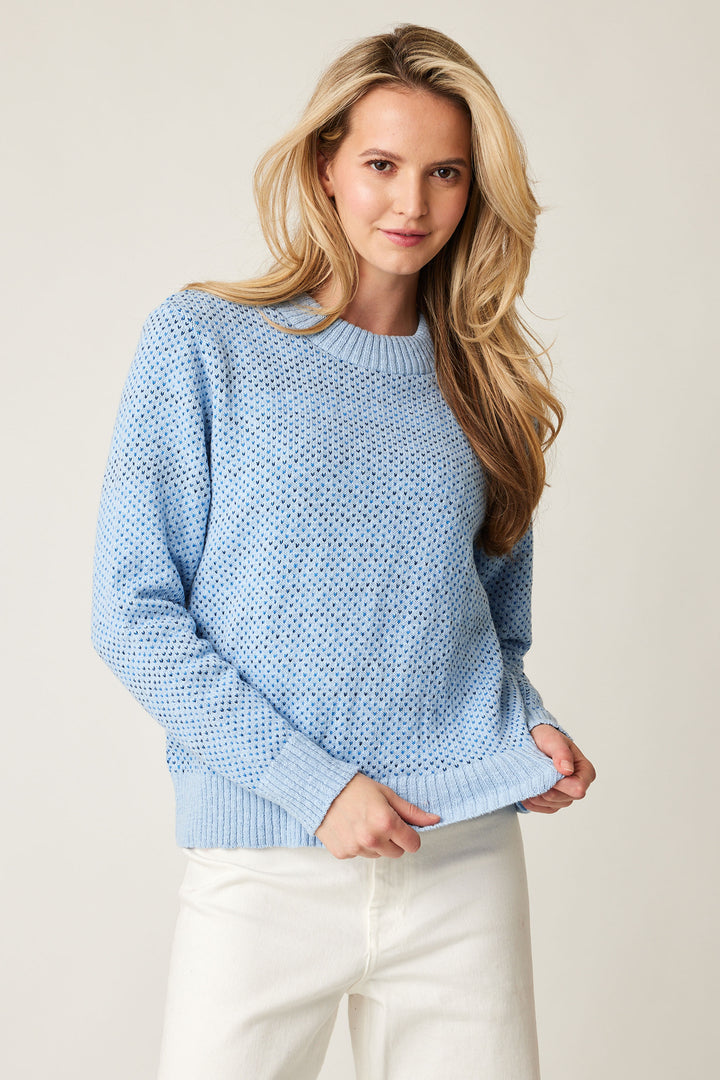 Cotton Country Fall 2024 Its neat design pattern and contrasting ribbed details give it a unique look. Made from soft and comfy sweater knit fabric, this sweater will keep you cozy and stylish all day long.