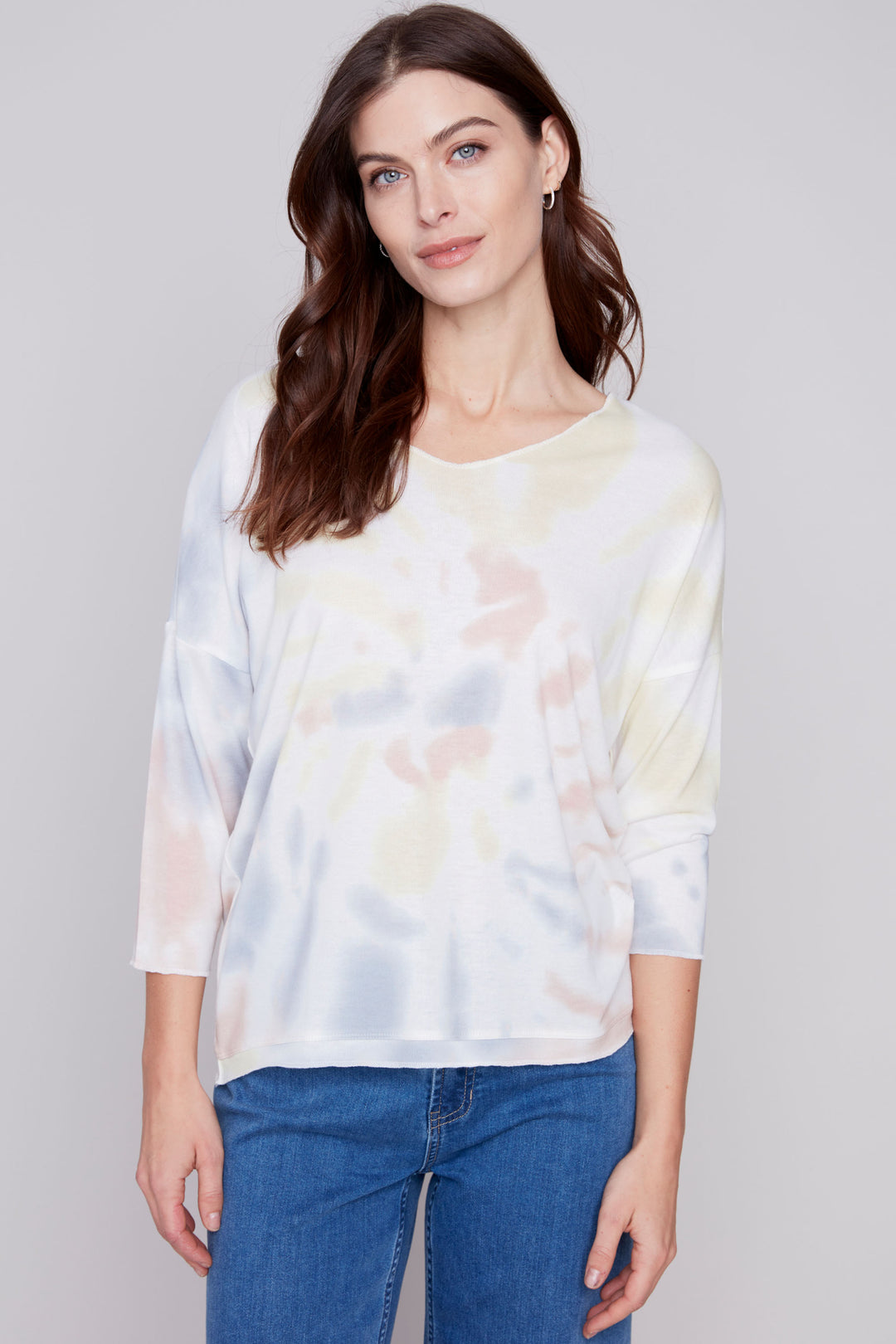 This effortless and comfortable tie dye top is the perfect addition for your summer wardrobe. It features a soft cut v-neck, relaxed fit long sleeves.