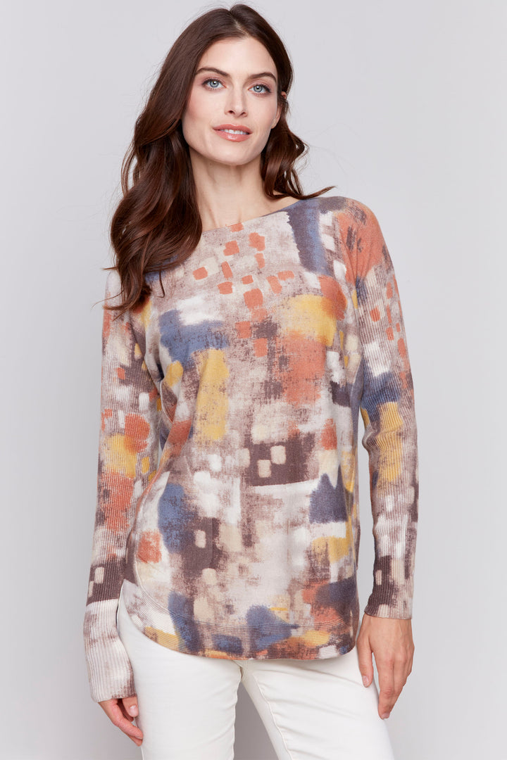 Charlie B Fall 2024  With its crewneck and light sweater material, this top is perfect for transitional weather. The straight cut long sleeves provide comfort and versatility for any occasion. 