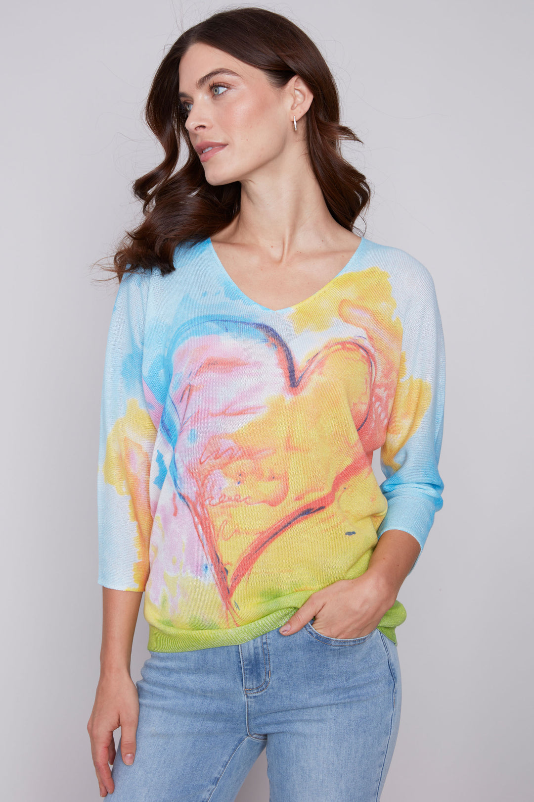 Featuring a soft cut v-neck and classic dolman sleeves, this charming heart print will add a playful touch to your wardrobe.