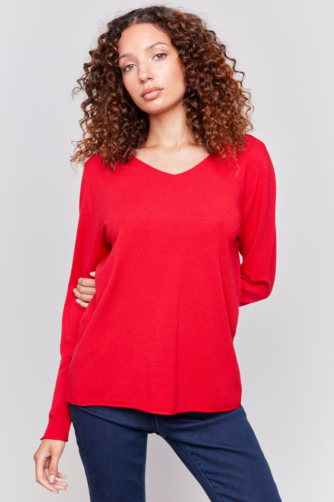 Charlie B Fall 2024 With its soft cut v-neck and light sweater material, this solid colour sweater top is great for the office or days out.