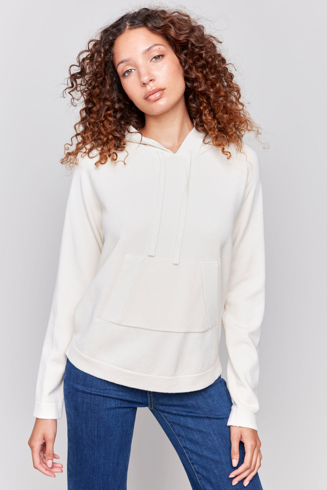 Charlie B Fall 2024 Made with plush knit fabric, you'll love the soft touch against your skin. The full length sleeves and large front pocket make it perfect for any casual occasion.