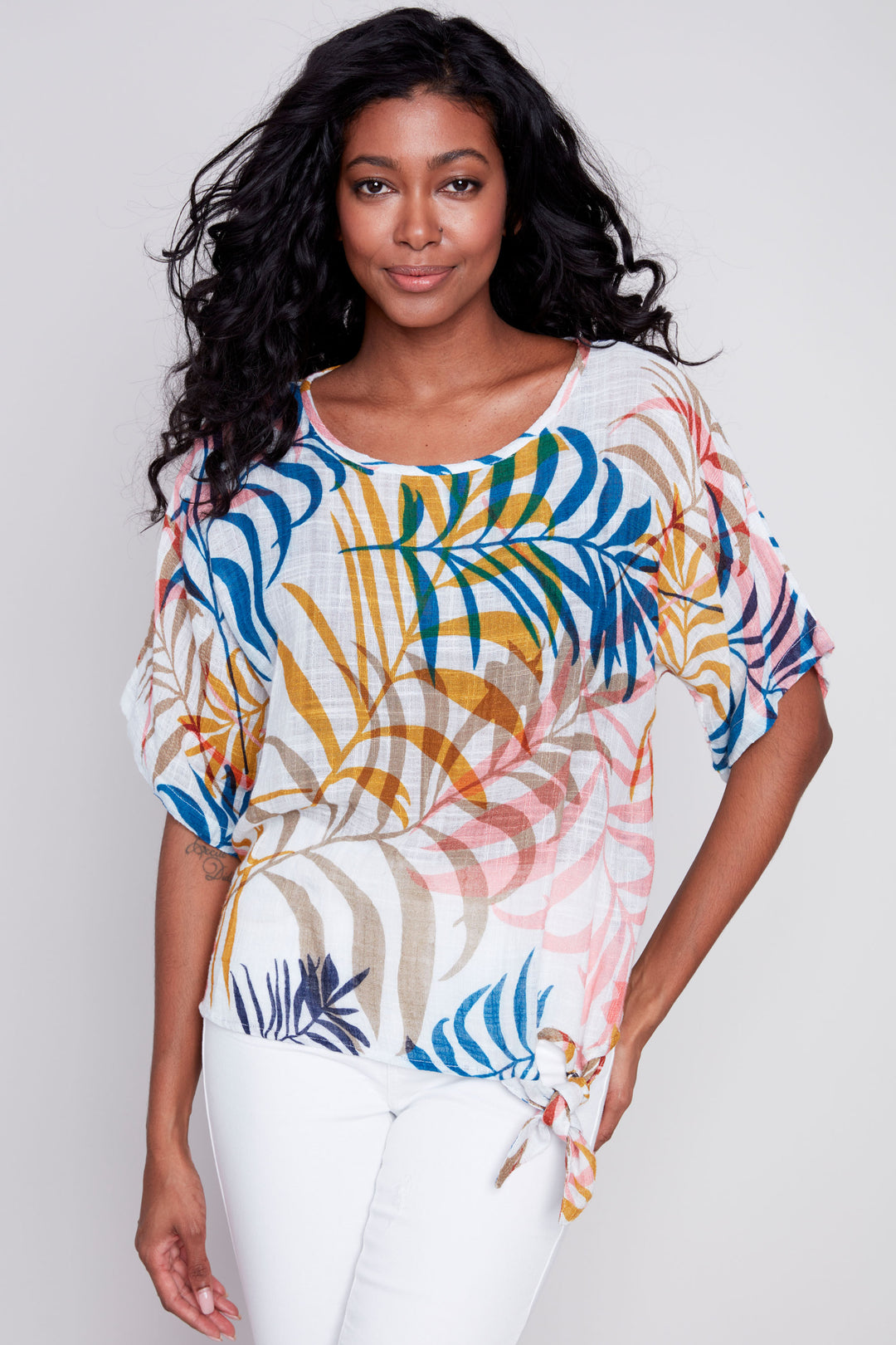 Made of soft, lightweight printed cotton gauze, this top features a neat abstract leaf print all-over and trendy dolman sleeves. 