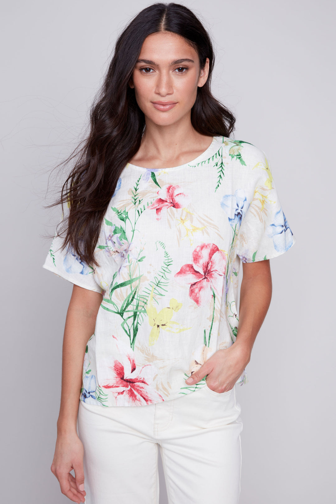 This top's all-linen fabric keeps it light, while its round neck and dolman short sleeves make for the perfect fit. And don't forget the playful printed floral design pattern.