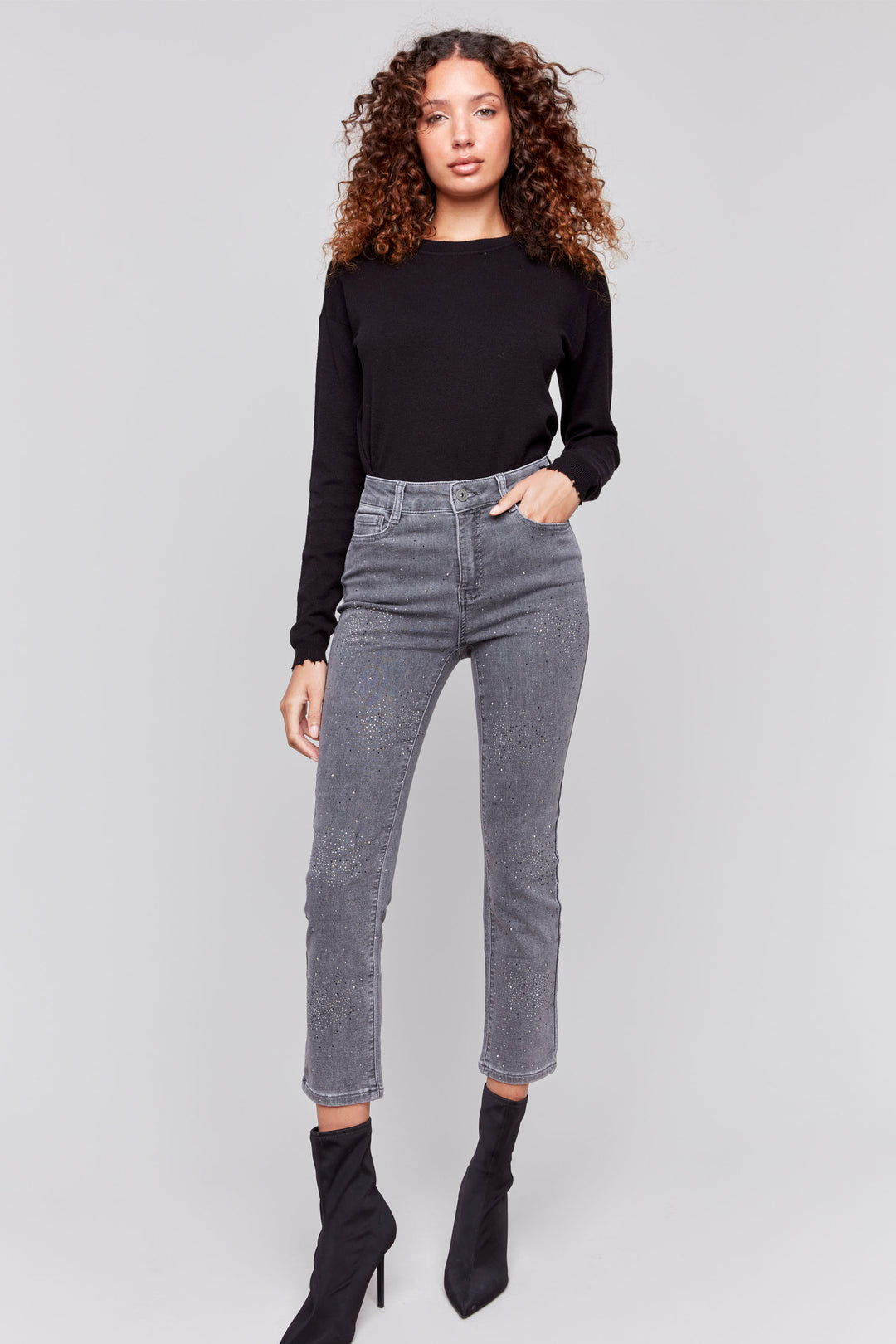 Cotton Country Fall 2024 These classy pants feature a slim fit and regular rise, perfect for any casual and or semi-formal event. The soft knit denim provides all-day comfort while the bling studs lining the front add a touch of glamour!