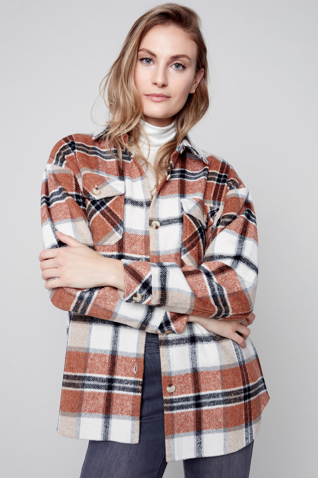 Crafted from the softest plaid flannel, this shirt jacket features a button-down front and chest flap pockets for a classic look that will always be in fashion.