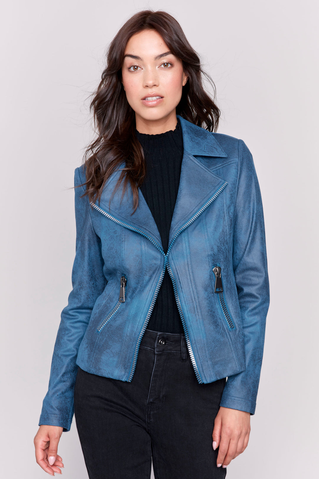 Charlie B Fall 2024  This vintage faux leather Perfecto style jacket is crafted to fit a sleek, confident look. This piece is complete with stylish zipper details that set it apart from the rest. 