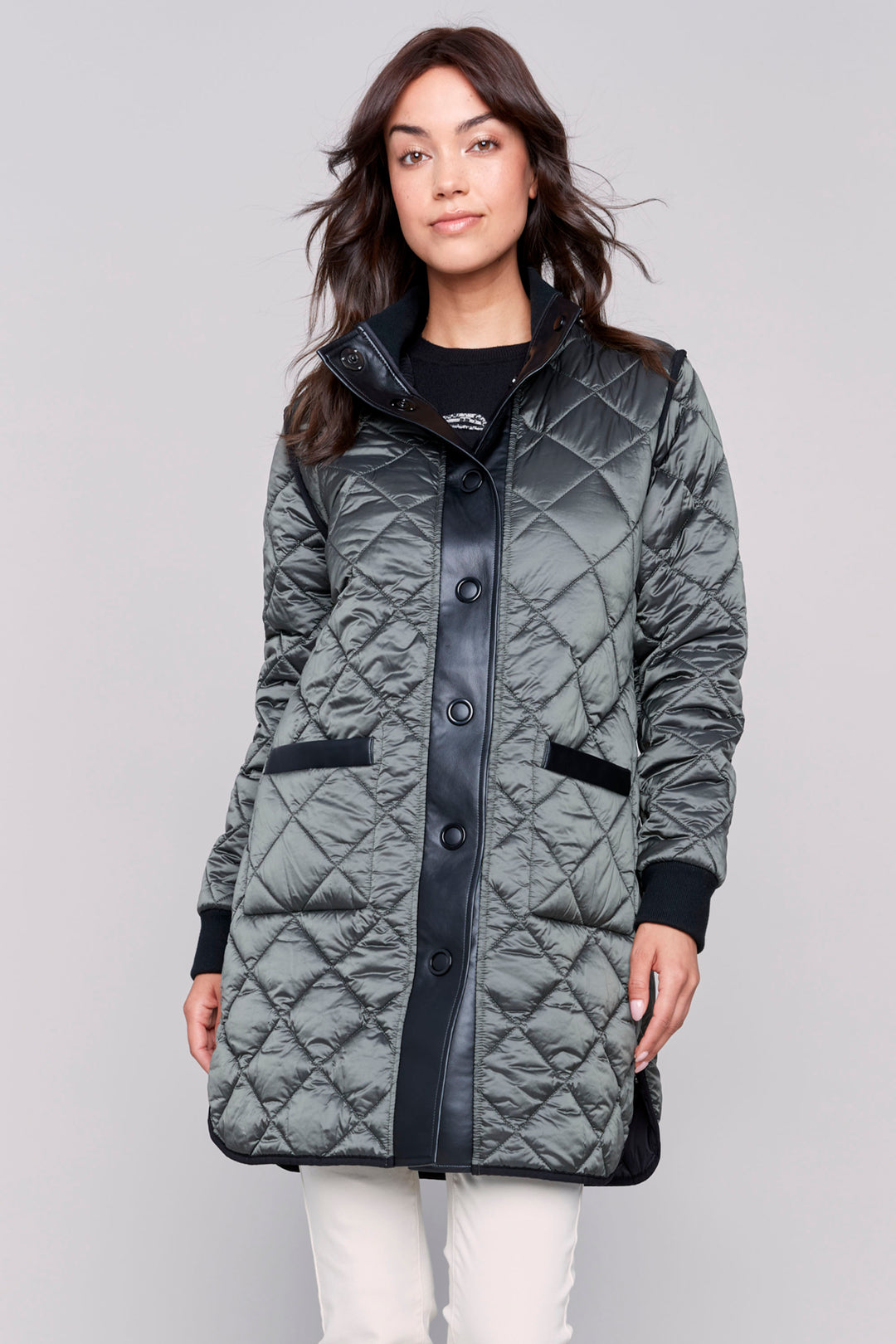 Charlie B Fall 2024 Featuring a long quilted puffer style, rib knit zipper-front closure and pockets, all in a bold fall colour. Wear it two ways!