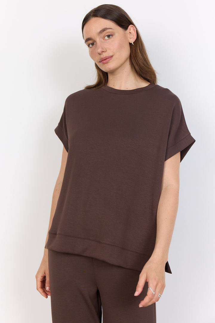 Soya Concept Fall 2025 
 With delightful solid colours to choose from, the round neckline and ultra soft fabric will keep you comfortable all day. Stay on-trend with this cap sleeve!