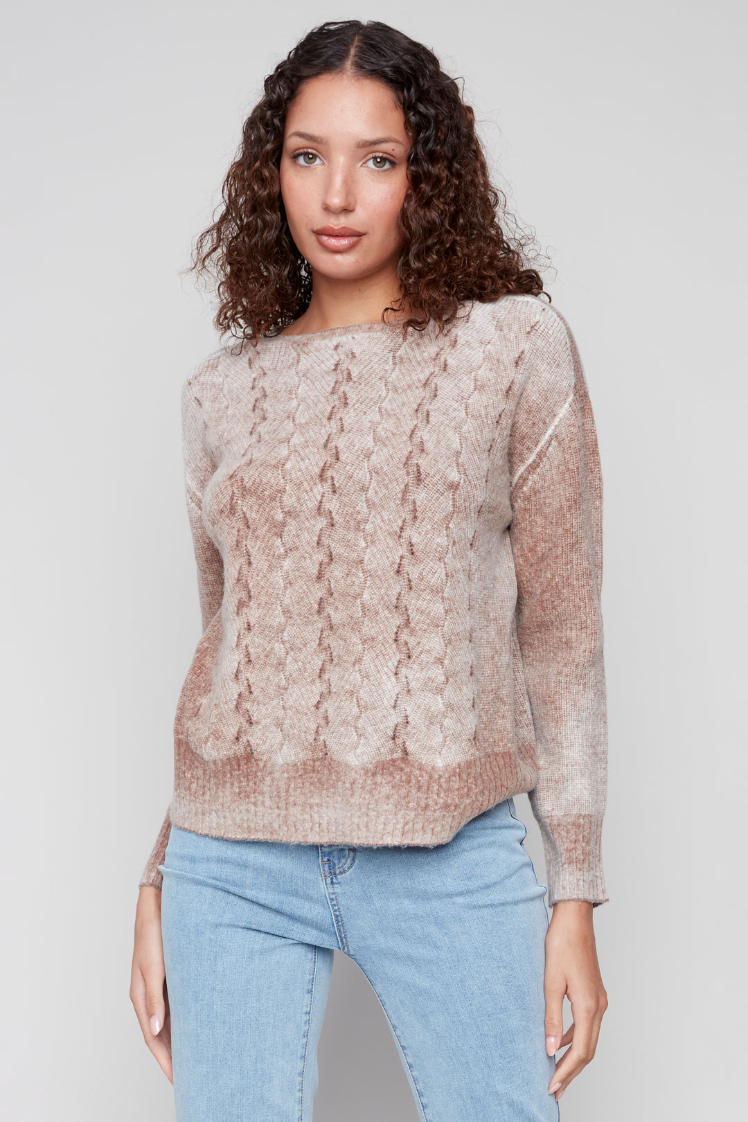 Charlie B Fall 2025 
Crafted from soft wool, this classic crew neck sweater features an elegant knit design that adds a touch of sophistication to your wardrobe. Ideal for cooler days, its long sleeves provide warmth while maintaining a refined look.