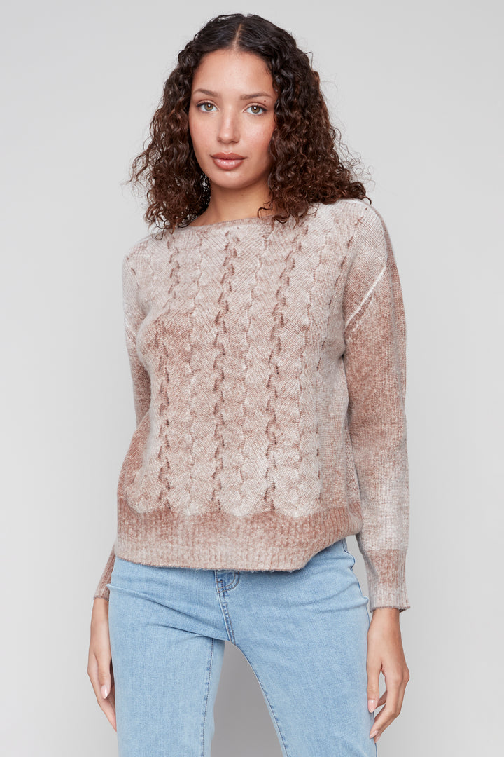 Charlie B Fall 2025 
Crafted from soft wool, this classic crew neck sweater features an elegant knit design that adds a touch of sophistication to your wardrobe. Ideal for cooler days, its long sleeves provide warmth while maintaining a refined look.