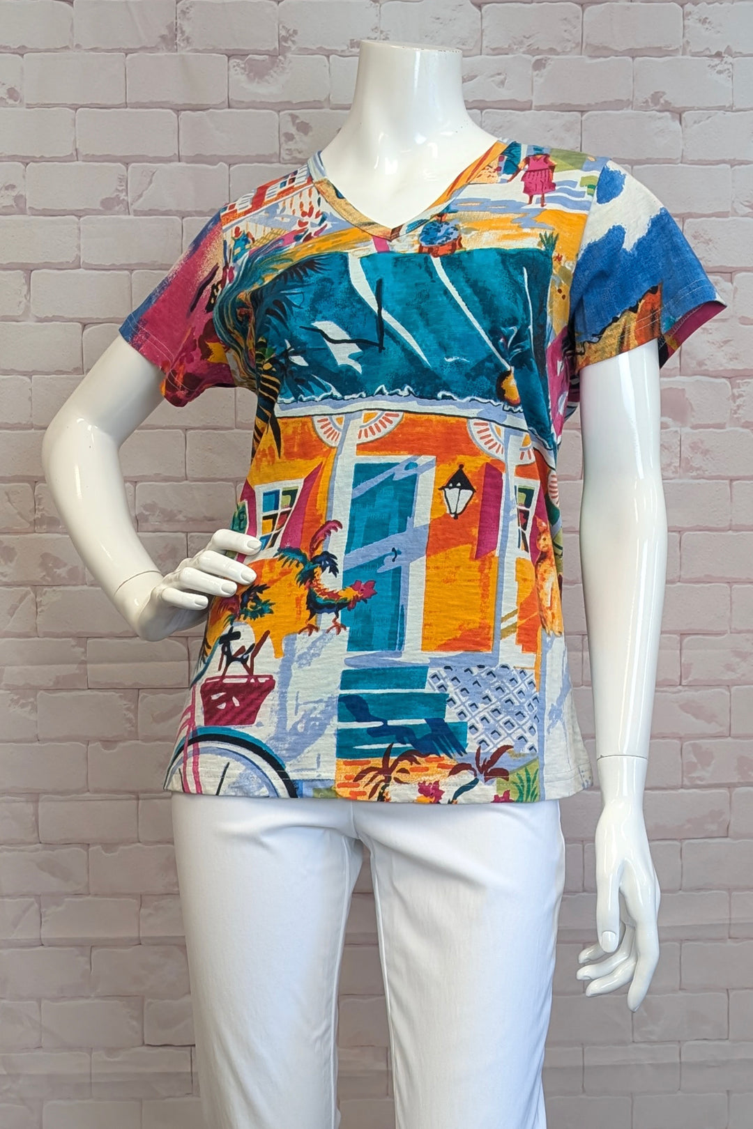 ORIENTIQUE Spring 2025 Made with all organic cotton, this tee offers a breezy and casual look while being super comfortable in its soft, stretch fabric.