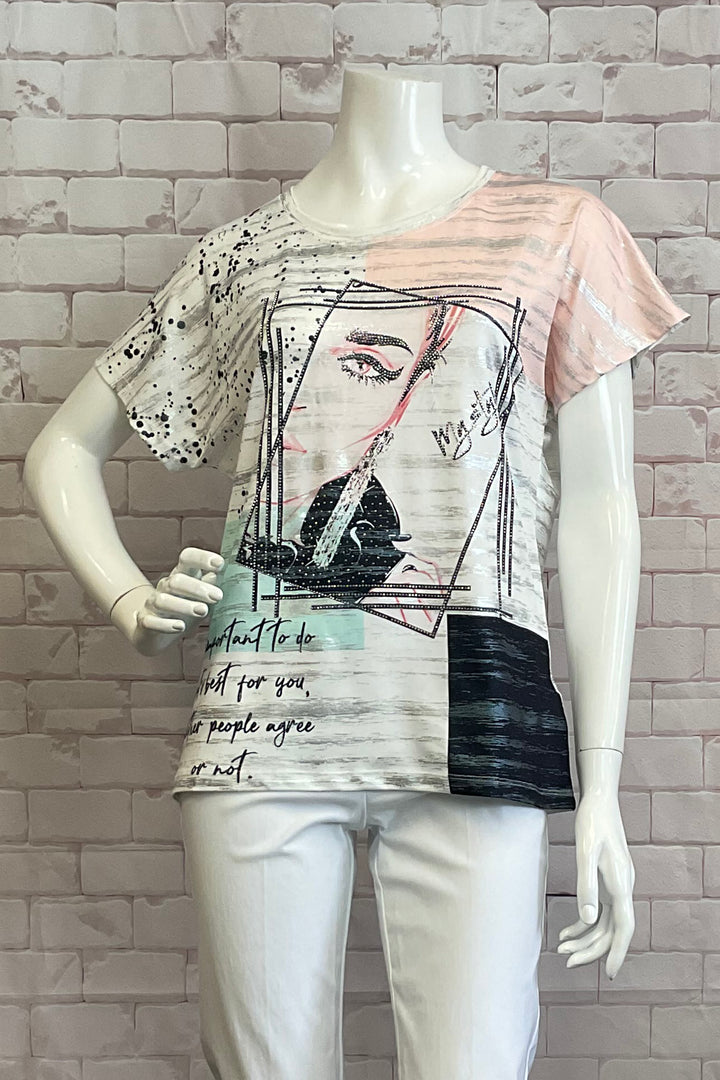 Ness Spring 2025 The round neckline and short sleeves make it easy and comfortable to wear, while the pink and black abstract stripe with face print on the front adds a touch of fun and playfulness to any outfit.