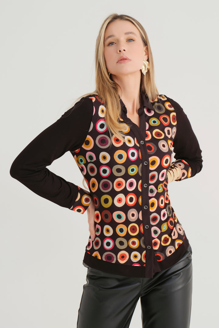 Dolcezza Fall 2024 This lightweight viscose-blend blouse features a fun art-inspired 'target' print long contrast sleeves and a classic collar.