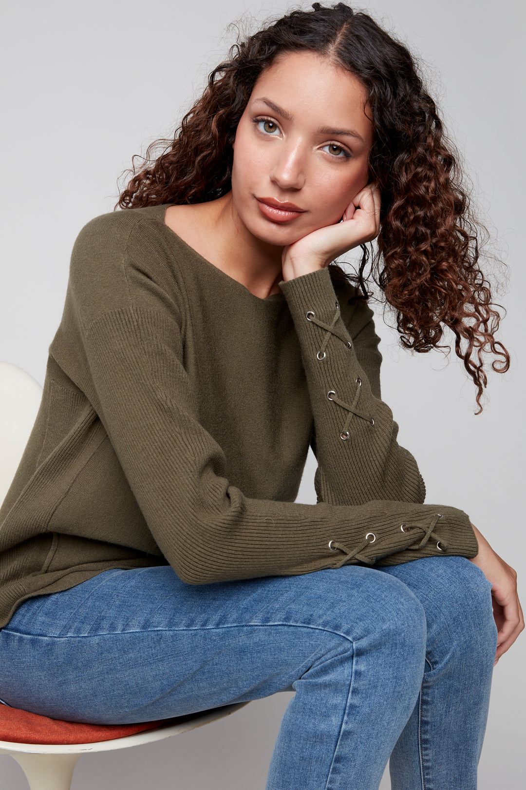 Charlie B Fall 2025 
In lovely fall colours, this cuff lace-up detail sweater with a rounded hem and side pockets is perfect for those crisp fall days.