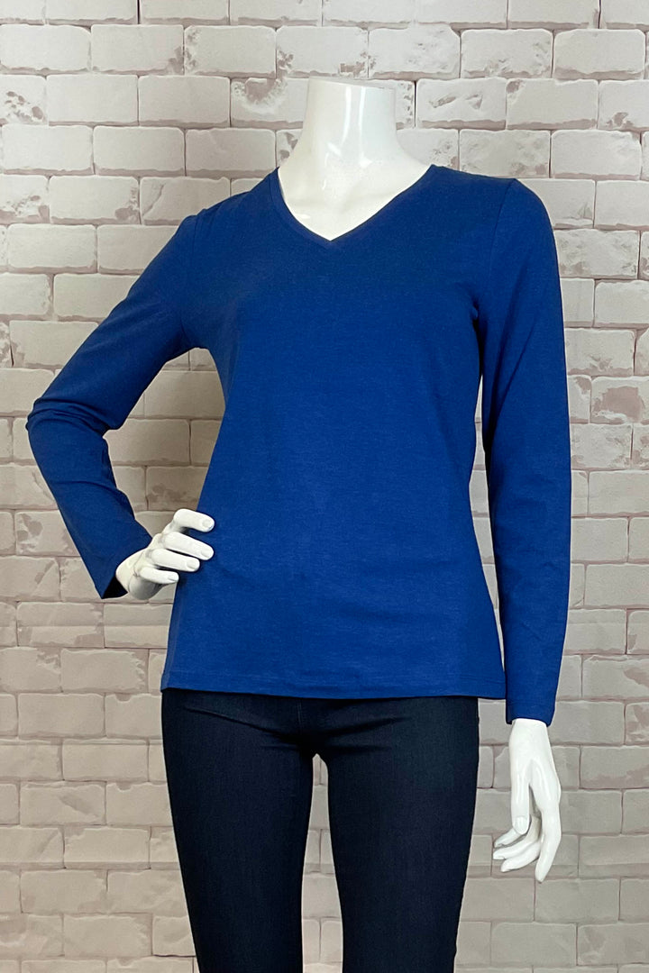 Dolcezza Fall 2024 The smart v-neckline creates a flattering silhouette and it’s a perfect chilly weather basic.