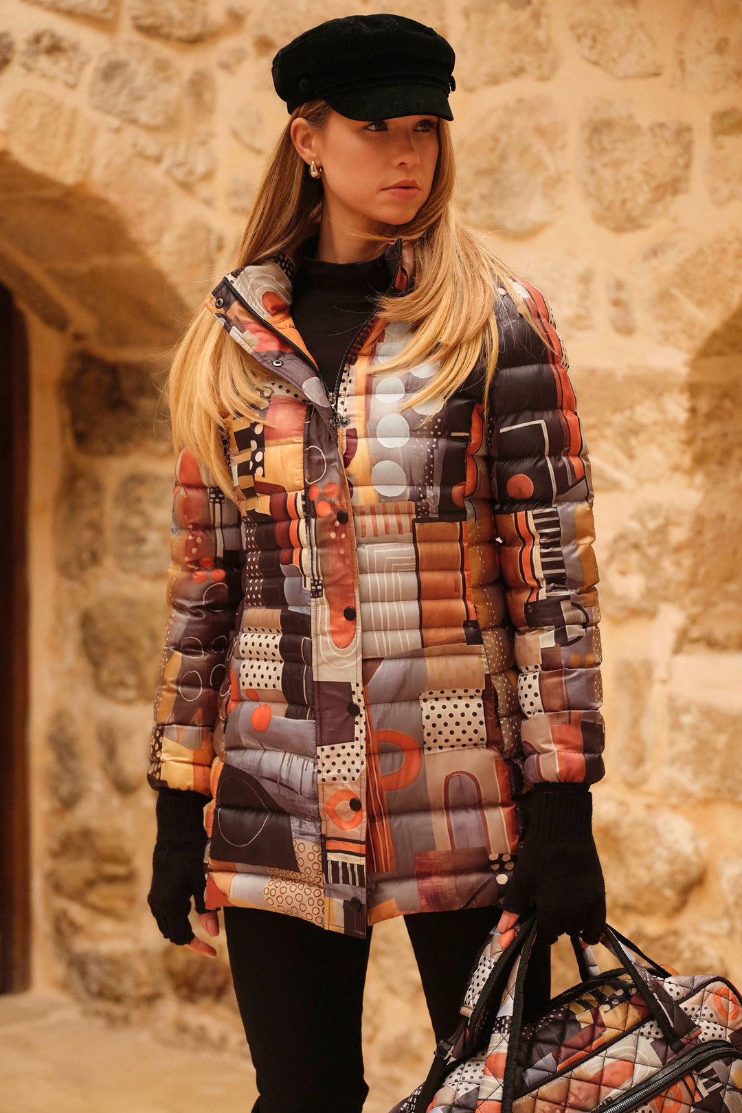 Dolcezza Fall 2024  Its all-over abstract print design and lightly padded fabric keep you fashionable and insulated on chilly fall and winter days. 