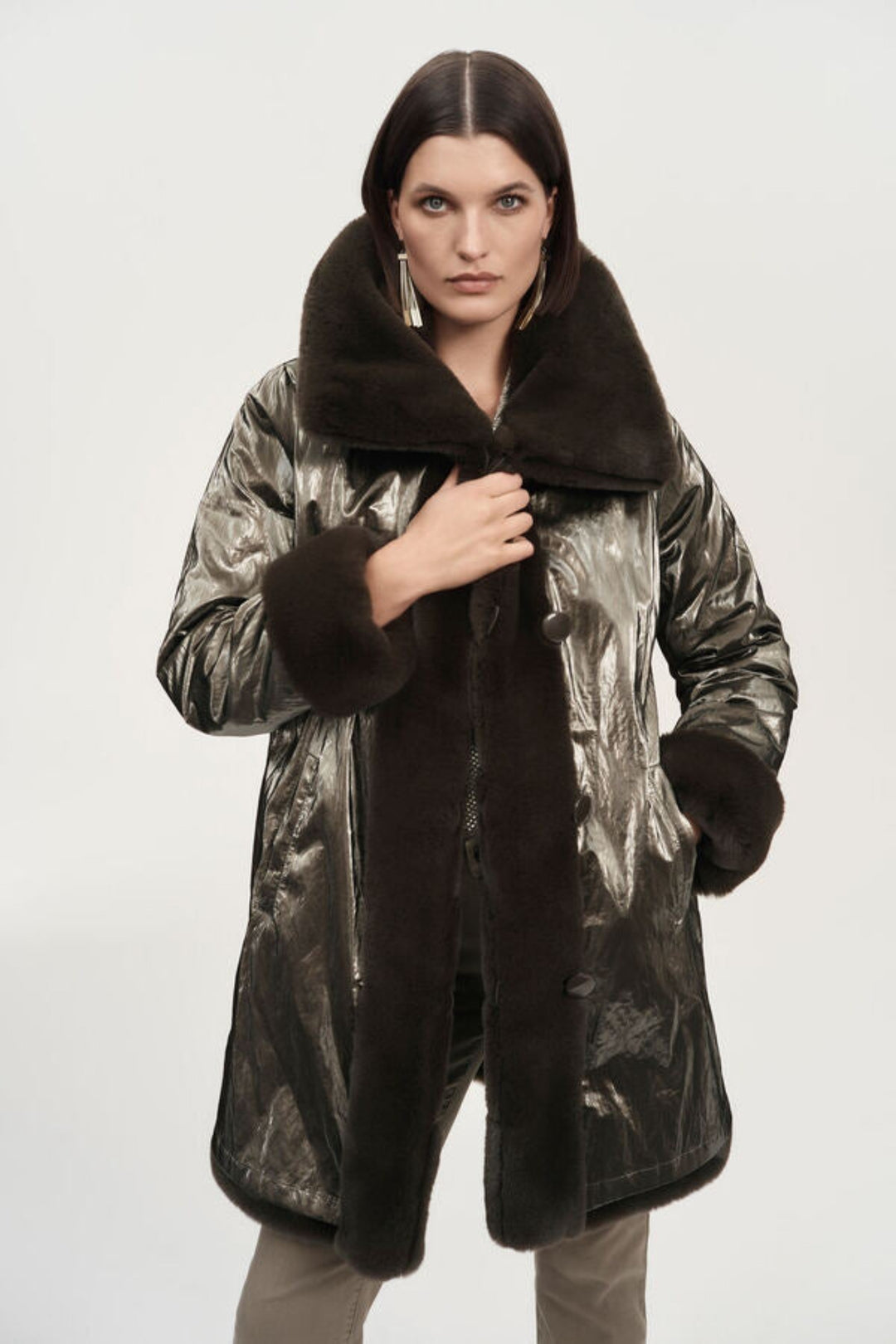 Joseph Ribkoff Fall 2024 Crafted from premium faux fur for a luxuriously soft feel, the coat has full length straight sleeves and a plush fabric that you'll love to wrap up in!
