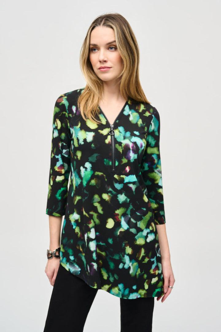 Joseph Ribkoff Fall 2024 Featuring stunning 3/4 sleeves, a zipped v-neckline and a chic, modern yet classic flowing abstract print top